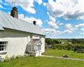 Enjoy a glass of wine at Well Farm Holiday Cottages - Wells Farm House; Cornwall