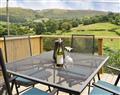 Enjoy a glass of wine at Wern Ddu Cottage; Powys