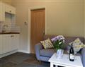 Enjoy a glass of wine at White House Cottages - The Hen House; England
