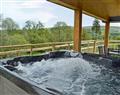 Enjoy a leisurely break at Woodland Cottages - River Lodge; Powys