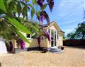 Enjoy a glass of wine at Woodside Cottage; Isle of Wight