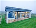 Relax in your Hot Tub with a glass of wine at Rafters, March End Lodges; Georgeham; Devon