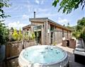 Relax in a Hot Tub at The Retreat, Strawberryfield Park; Cheddar; Somerset