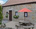 Enjoy a glass of wine at  Wayside Farm Cottages - Dairy Cottage; North Yorkshire