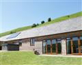 Relax in your Hot Tub with a glass of wine at 2 Beacon View Barn; ; Beguildy near Knighton