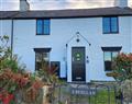 Enjoy a glass of wine at 3 Penllan Cottages; ; Axton near Trelawnyd