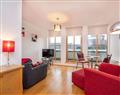 Enjoy a glass of wine at 404 By the Bridge Apartment; Inverness-Shire