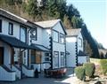 Enjoy a glass of wine at 5 Ladstock Hall (Deluxe); Keswick; Cumbria