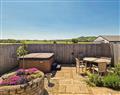 Lay in a Hot Tub at Applebarn Holidays  - The Dairy; Somerset