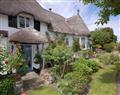 Enjoy a glass of wine at Appletree Cottage; ; Higher Brimley near Bovey Tracey