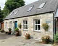Enjoy a glass of wine at Ard Darach Cottage; Perthshire