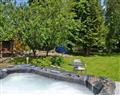 Relax in your Hot Tub with a glass of wine at Arosfa; Dyfed
