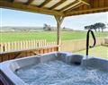 Enjoy your time in a Hot Tub at Atherfield Green Farm Holiday Cottages - Wisteria Cottage; Isle of Wight