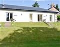 Relax in your Hot Tub with a glass of wine at Auchendennan - Primrose Cottage; Dumbartonshire