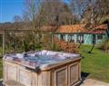 Relax in your Hot Tub with a glass of wine at Beech Cottage; Westleton; Suffolk