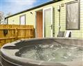 Relax in your Hot Tub with a glass of wine at Beech Tree; Cumbria