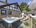 Relax in your Hot Tub with a glass of wine at Bella's Cottage; ; Highampton near Halwill Junction