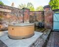 Lay in a Hot Tub at Betley Court Farm - Carpenters Cottage; Staffordshire