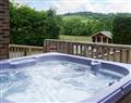 Lay in a Hot Tub at Bevan House; Powys