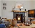 Enjoy a glass of wine at Black Spout Cottage; Perthshire