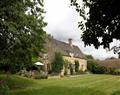Enjoy a glass of wine at Bookers Cottage; Bruern, near Chipping Norton; Oxfordshire