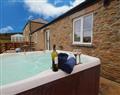 Enjoy your time in a Hot Tub at Bowjy; ; Truro