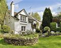 Enjoy a glass of wine at Bowness Cottage; Windermere; Cumbria
