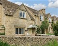Enjoy a glass of wine at Bramley Cottage; ; near Cirencester