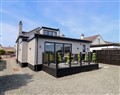 Enjoy a glass of wine at Bronallt; ; Cemaes Bay