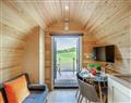 Lay in a Hot Tub at Brook Valley Glamping-Chestnut; Powys