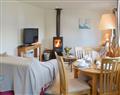 Take things easy at Burton Farm Cottages - The Stables; Devon