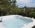 Relax in a Hot Tub at Caisteal Laith - Strathan Chalet; Sutherland