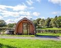 Relax in your Hot Tub with a glass of wine at Cambria Glamping - Bwthyn Bach Brefi; Dyfed