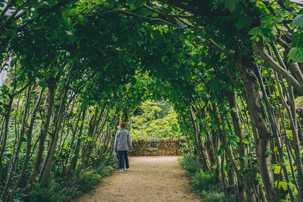 Canvas hideaway with farm-house shower at Hidcote Manor Farm in Gloucestershire