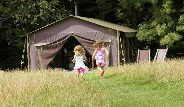 Canvas hideaway with private outdoor shower at Canfields Farm in West Sussex