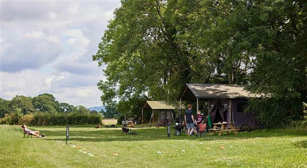 Canvas hideaway with private outdoor shower at Moor Farm in Gloucestershire