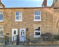 Enjoy a glass of wine at Caretaker's Cottage; North Yorkshire
