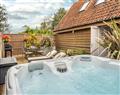 Relax in a Hot Tub at Cartshed Lodge; Hoveton near Norwich; Norfolk