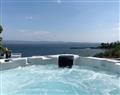 Relax in a Hot Tub at Chandlers Country House- Seaview Cottage; Bute