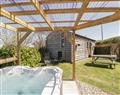 Relax in your Hot Tub with a glass of wine at Cherry Lodge; ; Washford near Williton