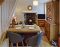 Enjoy a glass of wine at Christill Cottage; Cumbria