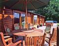 Relax in your Hot Tub with a glass of wine at Cider Mill Lodge; Chepstow; Gwent