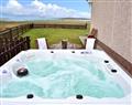 Enjoy your Hot Tub at Clachan Sands Cottage; ; Lochmaddy
