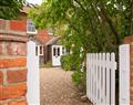 Enjoy a glass of wine at Clematis Cottage; Norfolk