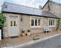 Relax in your Hot Tub with a glass of wine at Collingwood Cottage; Cumbria