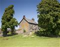 Enjoy a glass of wine at Coniston Farmhouse; Broughton-in-Furness; Cumbria