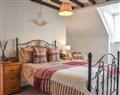 Enjoy a glass of wine at Cosy Beam Cottage; North Yorkshire