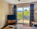 Enjoy a glass of wine at Cree View Cottage; Wigtownshire