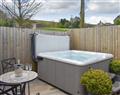 Relax in a Hot Tub at Cross Farm Cottages - One; West Yorkshire
