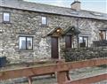 Enjoy a glass of wine at Cuckoo Brow Cottage; Cumbria